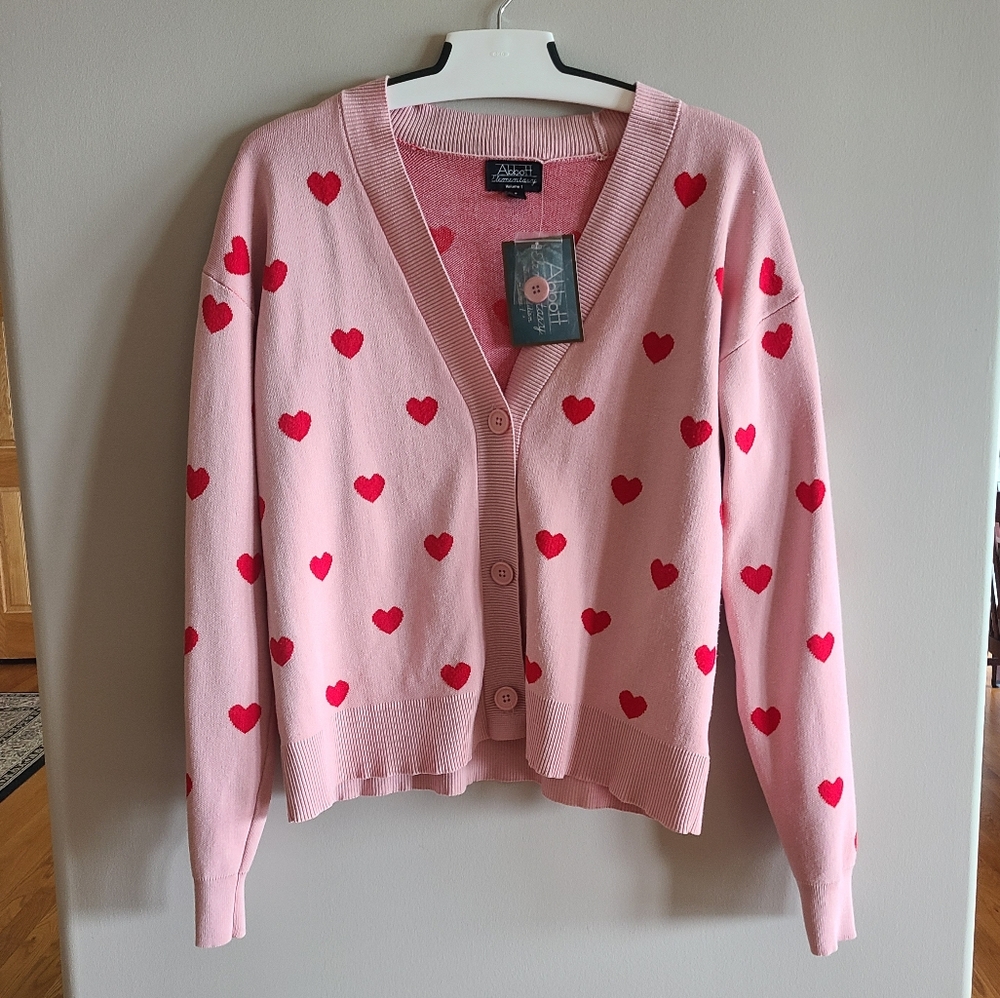 Abbott Elementary Red Heart Print Pink Cardigan
